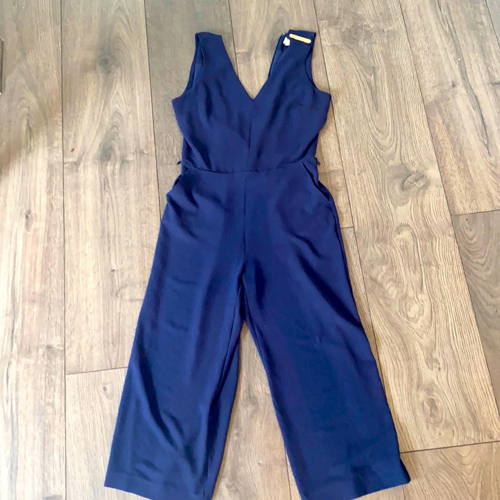 Brand new. Romper/pants suit